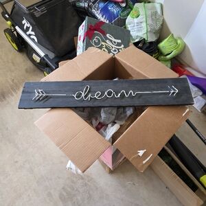 Dream sign 23 1/2 by 6 inches word is metal on wood